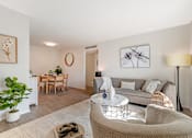 Thumbnail 12 of 31 - a living room with a couch and a table at Quail Ridge, Plainsboro Township, New Jersey