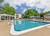 Thumbnail 7 of 31 - our resort style swimming pool is next to our building with trees at Quail Ridge, New Jersey