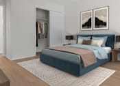 Thumbnail 7 of 35 - A bedroom with a large bed and a wardrobe. at Reflection Pointe, Flowood, MS, 39232