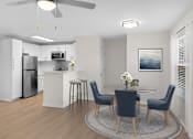 Thumbnail 4 of 35 - A modern kitchen with a dining table set for four. at Reflection Pointe, Flowood, MS