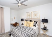 Thumbnail 27 of 29 - Bedroom with cozy bed and lamp at Robley Place, Lafayette