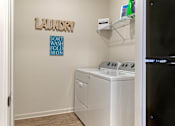 Thumbnail 12 of 33 - Laundry Room at Skyland Exchange Apartments, Asheville