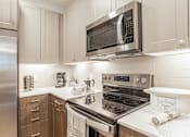 Thumbnail 21 of 35 - Fully Equipped Kitchen at Stone Loch Apartments, Tomball, TX 77375