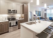 Thumbnail 19 of 35 - Kitchen at Stone Loch Apartments,Tomball, Texas
