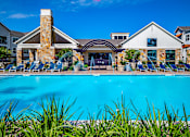 Thumbnail 3 of 35 - Blue cool pool at Stone Loch Apartments,Texas 77375