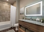 Thumbnail 15 of 52 - Large Soaking Tub In Master Bathroom at The Cosmopolitan, Tulsa