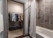 Thumbnail 17 of 52 - Spacious Bathrooms With Accessible Closet Comfortable Bedroom With Accessible Closet at The Cosmopolitan, Tulsa