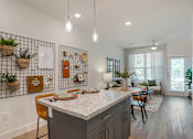Thumbnail 8 of 32 - Dining and kitchen at The Mason at Fremaux Park, Slidell 70458