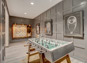 Thumbnail 35 of 52 - Game room with a foosball table at The Cosmopolitan, Tulsa, OK