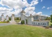 Thumbnail 1 of 20 - the sign at the entrance to thevillaggio community sign