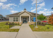 Thumbnail 12 of 36 - a building with a handicap sign in front of it