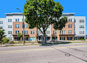 Thumbnail 9 of 40 - our apartments are located on the corner of a city street