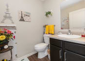 Thumbnail 24 of 36 - a bathroom with a toilet sink and mirror