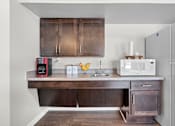 Thumbnail 20 of 38 - our apartments have a small kitchen with a microwave and coffee maker