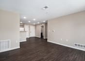 Thumbnail 24 of 40 - the living room and kitchen of a new home with wood flooring