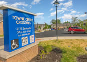 Thumbnail 32 of 36 - a sign in front of a building that reads tome creek crossing