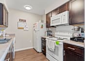 Thumbnail 7 of 12 - our apartments offer a kitchen