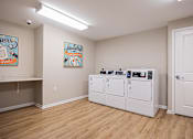 Thumbnail 43 of 58 - Laundry room with washer and dryer.