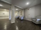 Thumbnail 13 of 22 - a living room with couches and chairs