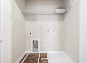 Thumbnail 23 of 35 - a room with white walls and a white bath tub in it