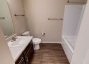 Thumbnail 22 of 26 - a bathroom with a toilet sink and bathtub