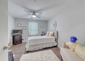 Thumbnail 50 of 50 - a bedroom with two beds and a ceiling fan