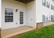 Thumbnail 46 of 66 - A white door with a window above it on a house.