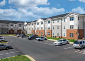 Thumbnail 5 of 22 - a parking lot with cars in front of an apartment building