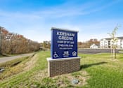 Thumbnail 29 of 84 - the sign at the entrance in front of a