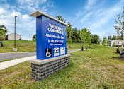 Thumbnail 38 of 45 - a sign for weider comforts on the side of a road