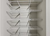 Thumbnail 14 of 53 - Empty shelves in a white pantry.