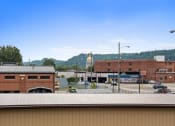 Thumbnail 7 of 19 - a view of the city from the roof of a building