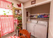Thumbnail 20 of 27 - a laundry room with a washer and dryer