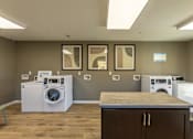 Thumbnail 20 of 55 - A laundry room with a washer and dryer in it.