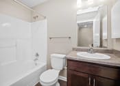 Thumbnail 13 of 72 - a bathroom with a toilet sink and shower and a mirror