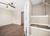 Thumbnail 9 of 72 - an empty bedroom with a ceiling fan and a closet
