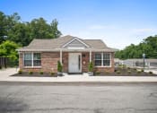 Thumbnail 39 of 72 - the front of a brick house with a white door