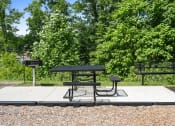 Thumbnail 71 of 72 - two picnic tables with benches in a park