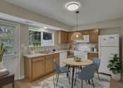 Thumbnail 8 of 9 - A kitchen with a table and chairs in the middle of the room.