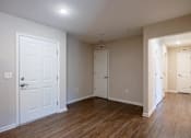 Thumbnail 34 of 52 - A white door is on the left side of the image.