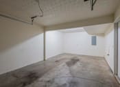 Thumbnail 57 of 59 - A room with a concrete floor and white walls.