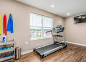 Thumbnail 17 of 41 - the apartments with resident amenities include a fitness center with treadmills and a flat screen tv