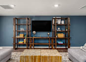 Thumbnail 25 of 41 - a living room with two couches and a coffee table