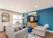 Thumbnail 27 of 36 - a living room with two couches and two chairs