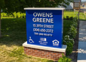 Thumbnail 36 of 36 - a sign in front of a building