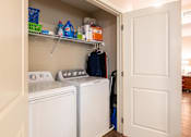 Thumbnail 15 of 55 - A laundry room with a washer and dryer.