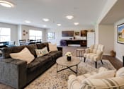 Thumbnail 3 of 27 - a living room with couches and chairs