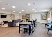Thumbnail 5 of 27 - our apartments have a lounge and dining area with a fireplace