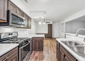 Thumbnail 8 of 22 - Kitchen and Dining Area