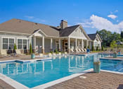 Thumbnail 1 of 32 - Resort-style Swimming Pool and Deck